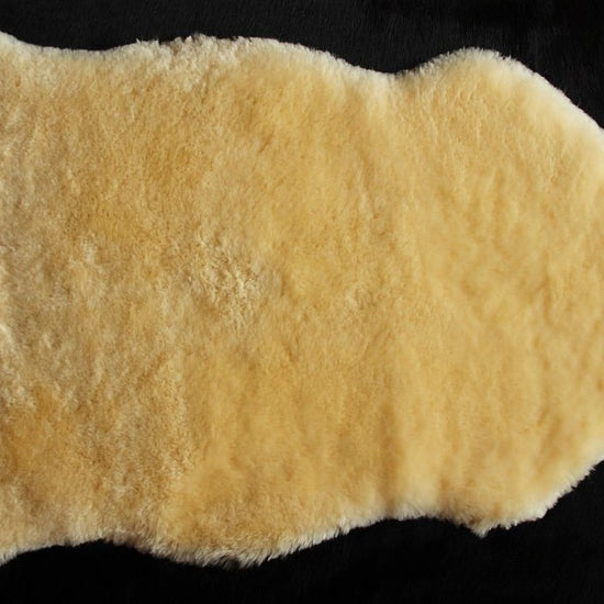 Baby-Lammfell medizinisch als Kinderwageneinlage