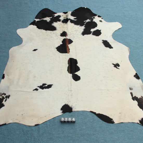 Kuhfell Schwarz Braun Weiß gepunktet (3284)