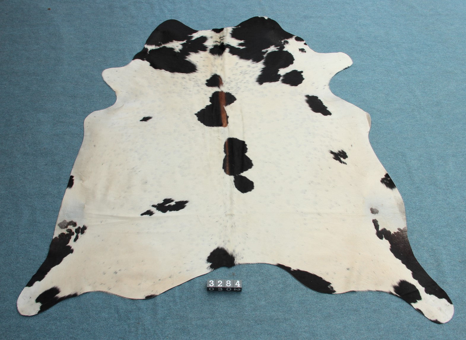 Kuhfell Schwarz Braun Weiß gepunktet (3284)