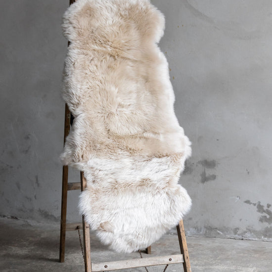 1,5er Lammfell Perl (grau beige)