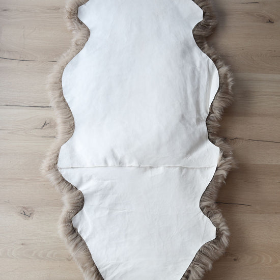 1,5er Lammfell Taupe (grau braun)