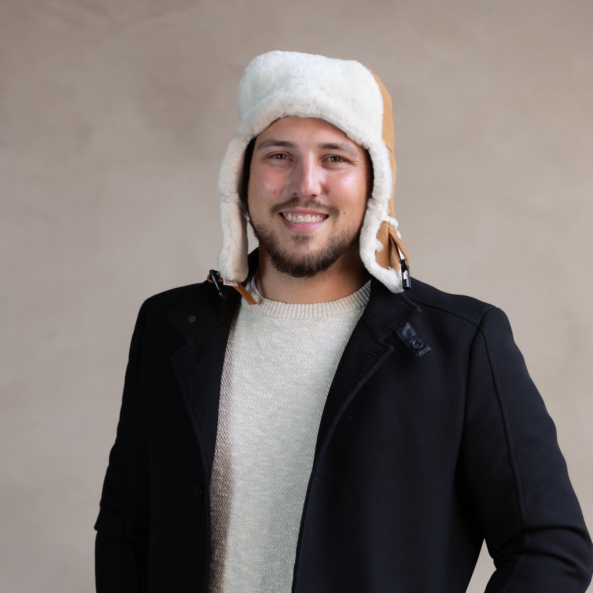 Mütze aus Lammfell Beige