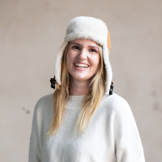 Mütze aus Lammfell Beige