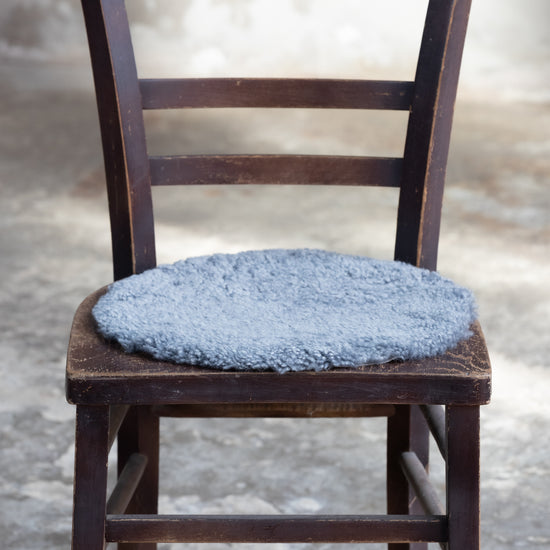 Lammfell Sitzauflage Curly Rund Grau