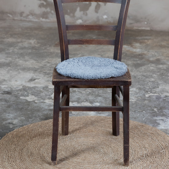 Lammfell Sitzauflage Curly Rund Grau