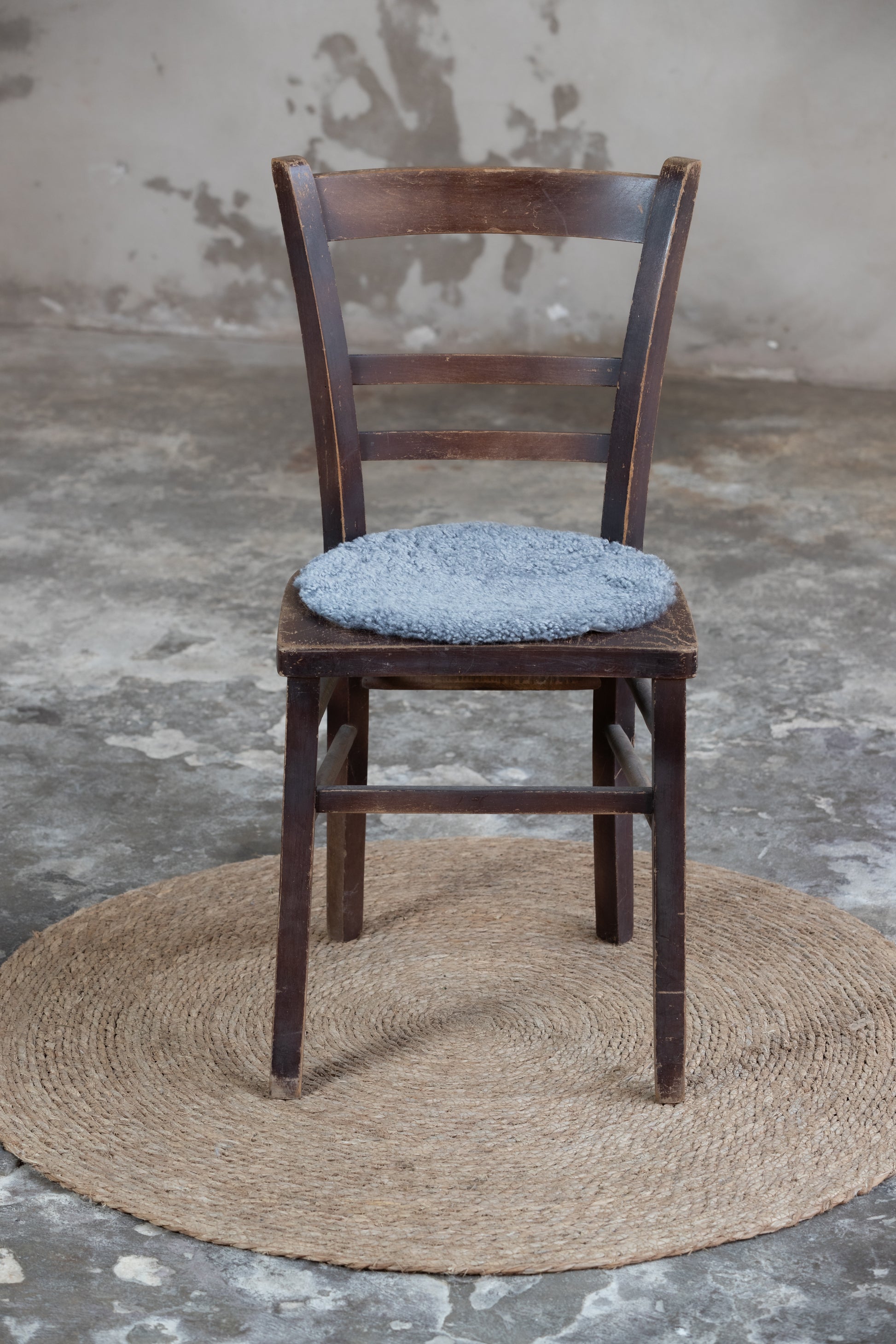 Lammfell Sitzauflage Curly Rund Grau