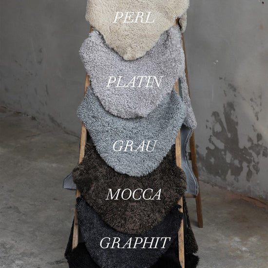 Lammfell Sitzauflage Curly Rund Grau