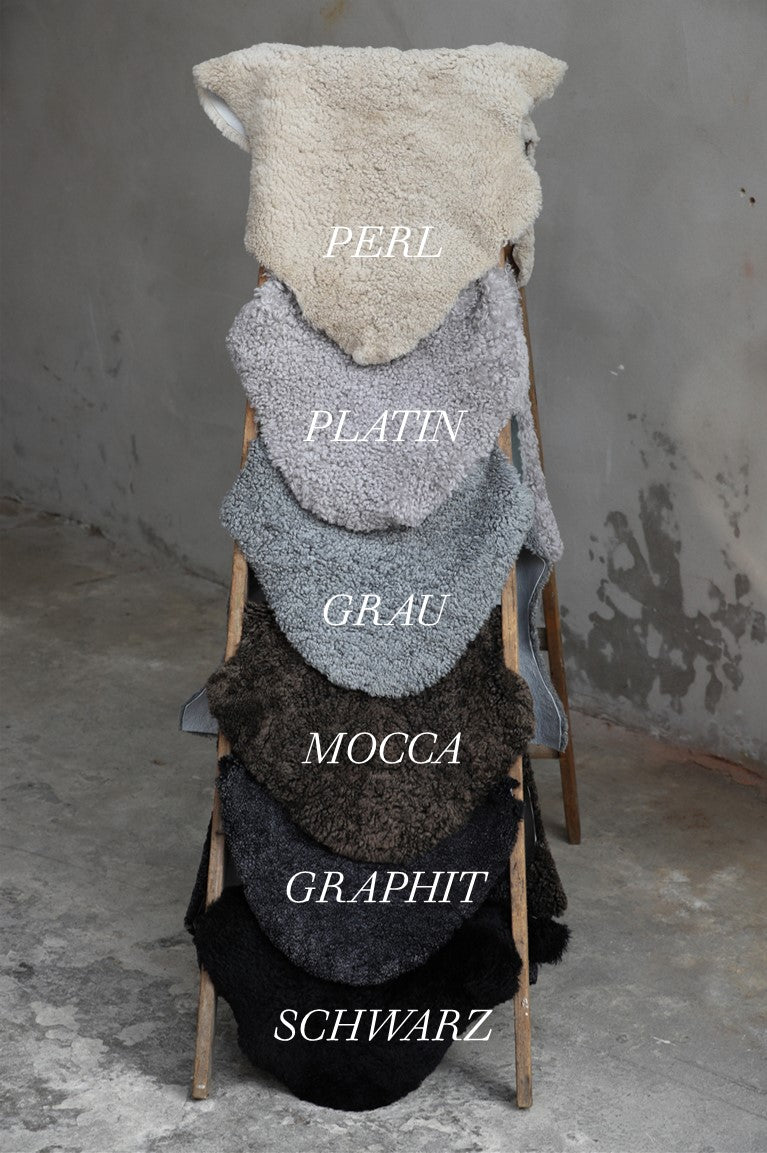 Lammfell Sitzauflage Curly Rund Grau