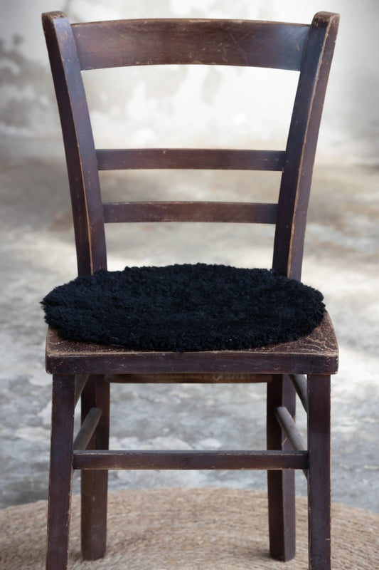 Lammfell Sitzauflage Curly Rund Schwarz